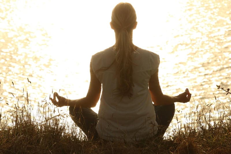 Woman meditating in nature
